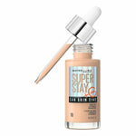 Flydende Make Up Base Maybelline Super Stay Skin Tint Nº 10 30 ml C-vitamin produktemballage