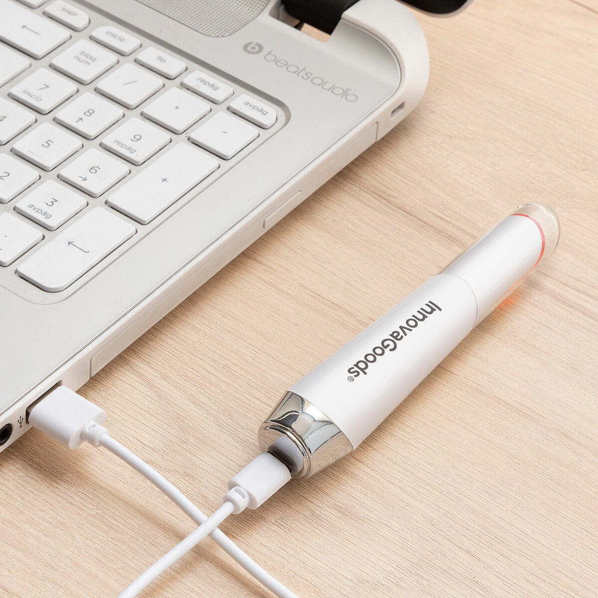 Anti-aging øjenmassageapparat med fototerapi, termoterapi og vibration dertil InnovaGoods produktemballage